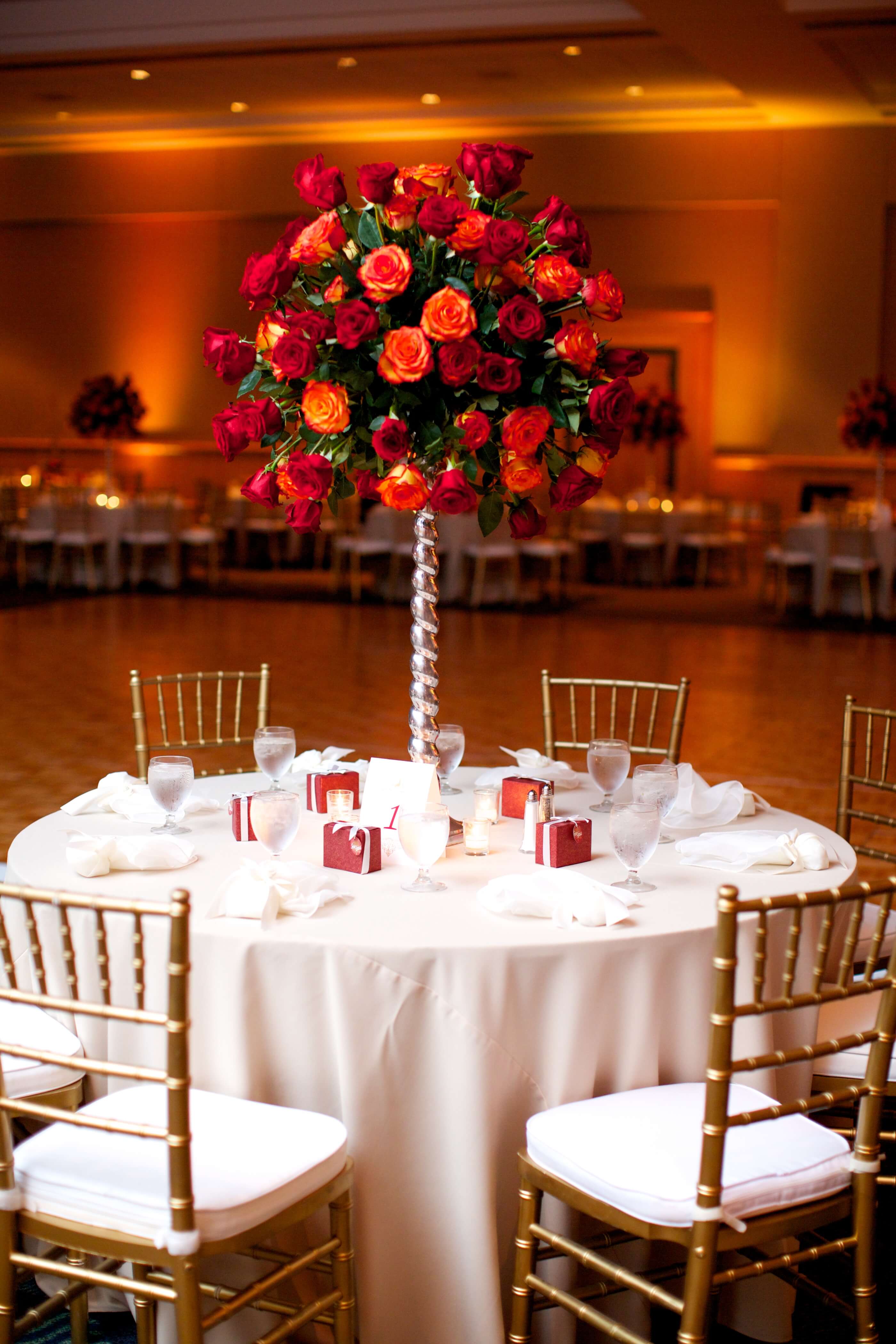 This warm red and orange uplighting created a cozy Fall environment. 